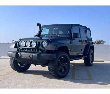 2011 Jeep Wrangler for sale is a Green 2011 Jeep Wrangler Car for Sale in Huntington Beach CA