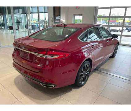 2018UsedFordUsedFusionUsedAWD is a Red 2018 Ford Fusion Car for Sale in Milwaukee WI