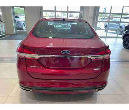 2018UsedFordUsedFusionUsedAWD is a Red 2018 Ford Fusion Car for Sale in Milwaukee WI