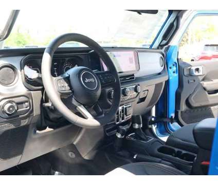 2024 Jeep Wrangler Sport S is a Blue 2024 Jeep Wrangler Sport Car for Sale in Rockford IL