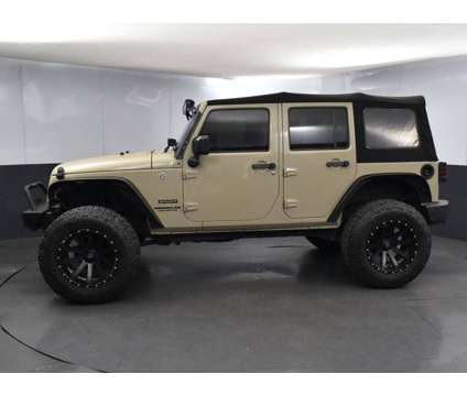 2017 Jeep Wrangler Unlimited Sport is a Gold 2017 Jeep Wrangler Unlimited Sport Car for Sale in Greenville SC