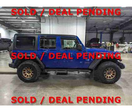 2018 Jeep Wrangler Unlimited Rubicon is a Blue 2018 Jeep Wrangler Unlimited Rubicon Car for Sale in Butler PA