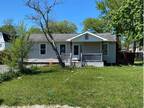 Foreclosure Property: E Flower St