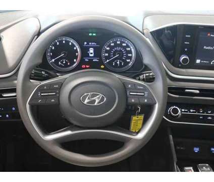 2023 Hyundai Sonata SE is a Red 2023 Hyundai Sonata SE Sedan in Lansing MI