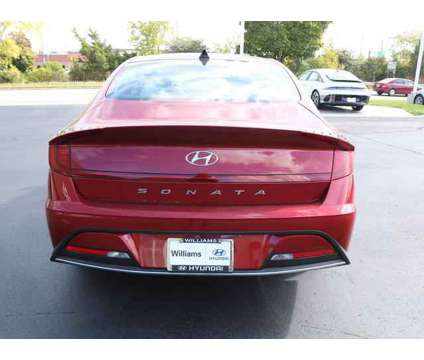 2023 Hyundai Sonata SE is a Red 2023 Hyundai Sonata SE Sedan in Lansing MI