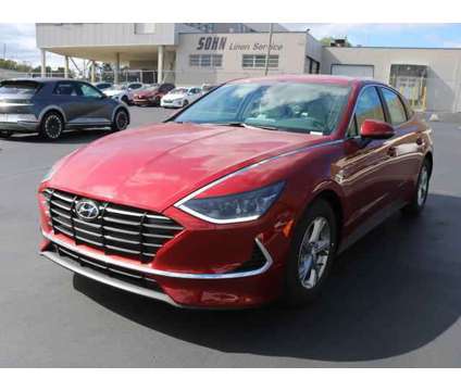 2023 Hyundai Sonata SE is a Red 2023 Hyundai Sonata SE Sedan in Lansing MI