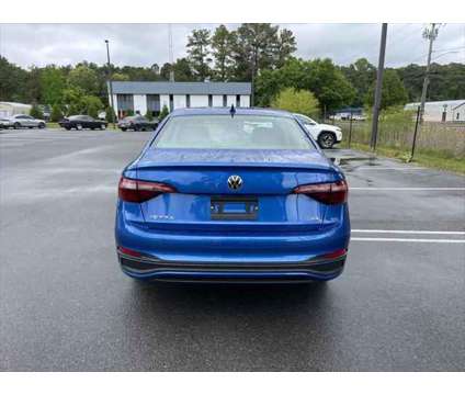 2024 Volkswagen Jetta SE is a Blue 2024 Volkswagen Jetta SE Sedan in Salisbury MD