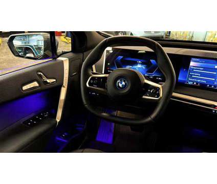 2025 BMW iX xDrive50 is a Grey 2025 BMW 325 Model iX SUV in Huntington Station NY