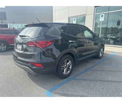2018 Hyundai Santa Fe Sport 2.4L is a Black 2018 Hyundai Santa Fe Sport 2.4L SUV in Charleston SC