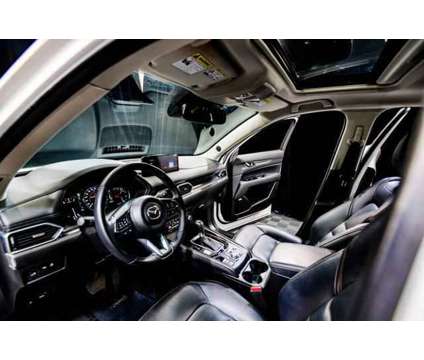 2021 Mazda CX-5 Grand Touring is a White 2021 Mazda CX-5 Grand Touring SUV in Peoria AZ