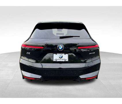 2025 BMW iX xDrive50 is a Black 2025 BMW 325 Model iX SUV in Huntington Station NY