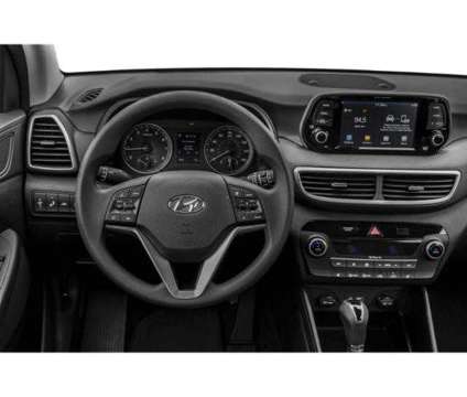 2021 Hyundai Tucson SEL is a Red 2021 Hyundai Tucson SUV in Holyoke MA