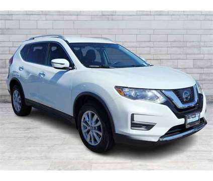 2017 Nissan Rogue SV is a White 2017 Nissan Rogue SV Station Wagon in Longmont CO