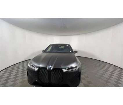 2025 BMW iX xDrive50 is a Grey 2025 BMW 325 Model iX SUV in Freeport NY