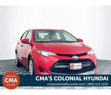 2018 Toyota Corolla LE is a Red 2018 Toyota Corolla LE Sedan in Colonial Heights VA