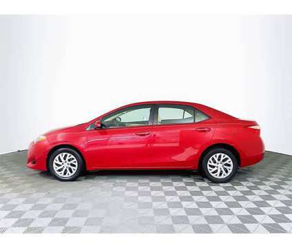 2018 Toyota Corolla LE is a Red 2018 Toyota Corolla LE Sedan in Colonial Heights VA