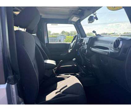 2013 Jeep Wrangler Sport is a 2013 Jeep Wrangler Sport SUV in Dubuque IA