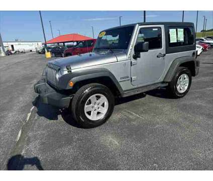 2013 Jeep Wrangler Sport is a 2013 Jeep Wrangler Sport SUV in Dubuque IA