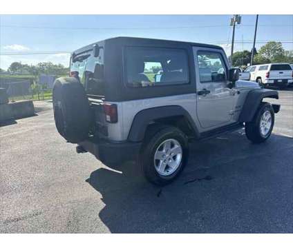 2013 Jeep Wrangler Sport is a 2013 Jeep Wrangler Sport SUV in Dubuque IA