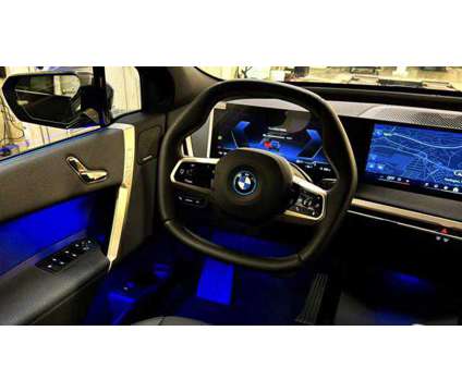 2025 BMW iX xDrive50 is a Black 2025 BMW 325 Model iX SUV in Huntington Station NY