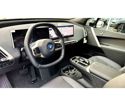 2025 BMW iX xDrive50 is a Black 2025 BMW 325 Model iX SUV in Huntington Station NY