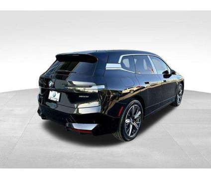 2025 BMW iX xDrive50 is a Black 2025 BMW 325 Model iX SUV in Huntington Station NY