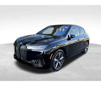 2025 BMW iX xDrive50 is a Black 2025 BMW 325 Model iX SUV in Huntington Station NY