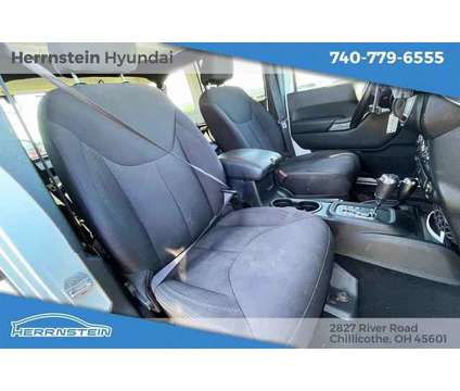 2015 Jeep Wrangler Unlimited Sport is a White 2015 Jeep Wrangler Unlimited Sport SUV in Chillicothe OH