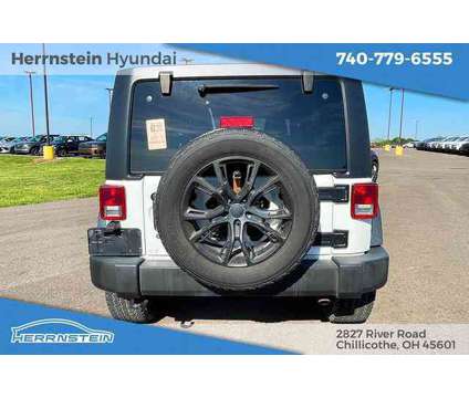 2015 Jeep Wrangler Unlimited Sport is a White 2015 Jeep Wrangler Unlimited Sport SUV in Chillicothe OH