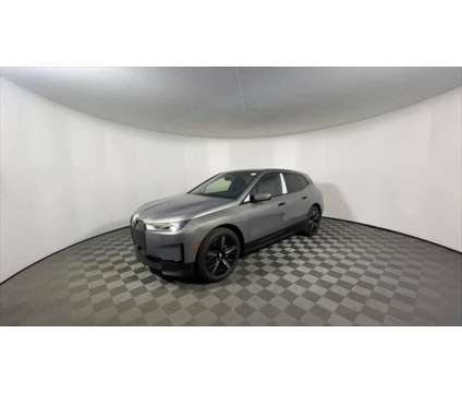 2025 BMW iX xDrive50 is a Grey 2025 BMW 325 Model iX SUV in Freeport NY
