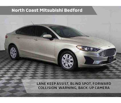 2019 Ford Fusion S is a Gold, White 2019 Ford Fusion S Sedan in Bedford OH