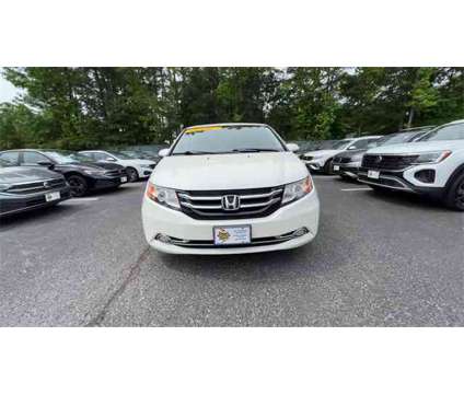 2017 Honda Odyssey Touring is a White 2017 Honda Odyssey Touring Car for Sale in Newport News VA