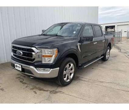 2021 Ford F-150 XLT is a Blue 2021 Ford F-150 XLT Truck in Corsicana TX