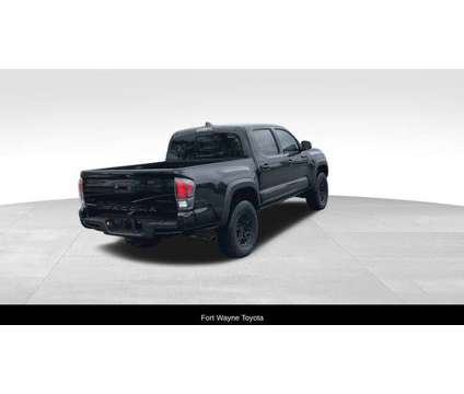 2020 Toyota Tacoma TRD Pro V6 is a Black 2020 Toyota Tacoma TRD Pro Truck in Fort Wayne IN