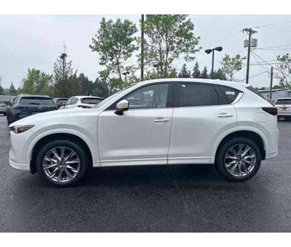 2024 Mazda CX-5 2.5 S Premium Package is a White 2024 Mazda CX-5 SUV in Gladstone OR