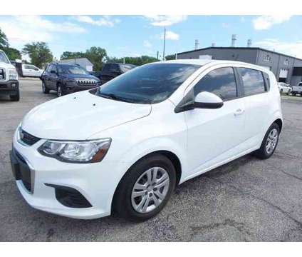 2020 Chevrolet Sonic LT is a White 2020 Chevrolet Sonic LT Car for Sale in Independence KS