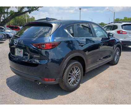 2021 Mazda CX-5 Touring is a Blue 2021 Mazda CX-5 Touring SUV in Vero Beach FL