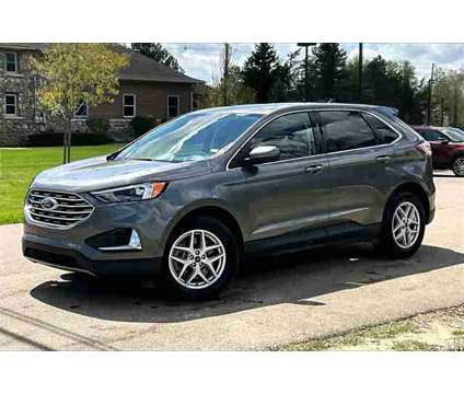 2022 Ford Edge SEL is a Grey 2022 Ford Edge SEL SUV in Ortonville MI