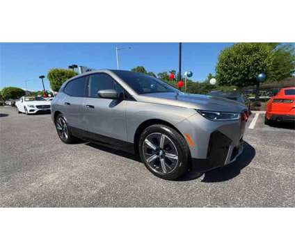 2025 BMW iX xDrive50 is a Grey 2025 BMW 325 Model iX SUV in Newport News VA