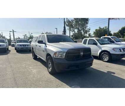 2016 Ram 1500 Quad Cab for sale is a Grey 2016 RAM 1500 Model Car for Sale in Riverside CA