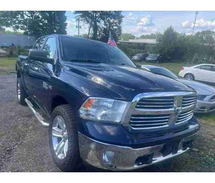 2014 Ram 1500 Crew Cab for sale is a Blue 2014 RAM 1500 Model Car for Sale in Lithonia GA