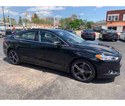 2016 Ford Fusion for sale is a Black 2016 Ford Fusion Car for Sale in Toledo OH