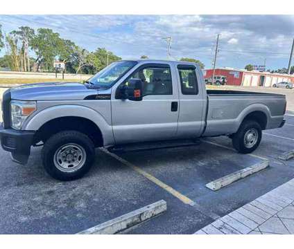 2013 Ford F250 Super Duty Super Cab for sale is a Silver 2013 Ford F-250 Super Duty Car for Sale in Orlando FL
