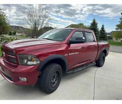 2011 Ram 1500 Crew Cab for sale is a Red 2011 RAM 1500 Model Car for Sale in Billings MT