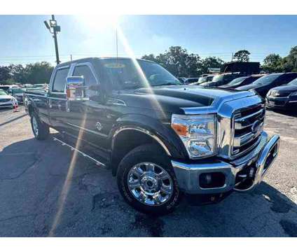 2014 Ford F250 Super Duty Crew Cab for sale is a Black 2014 Ford F-250 Super Duty Car for Sale in Orlando FL