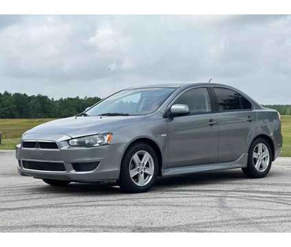 2014 Mitsubishi Lancer for sale is a Silver 2014 Mitsubishi Lancer Car for Sale in Houston TX