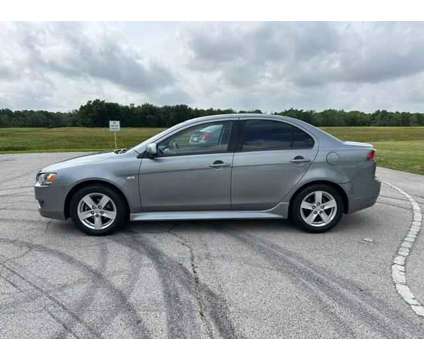 2014 Mitsubishi Lancer for sale is a Silver 2014 Mitsubishi Lancer Car for Sale in Houston TX