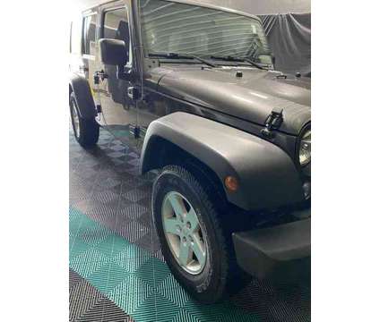 2017UsedJeepUsedWrangler UnlimitedUsed4x4 is a Grey 2017 Jeep Wrangler Unlimited Car for Sale in Brunswick OH