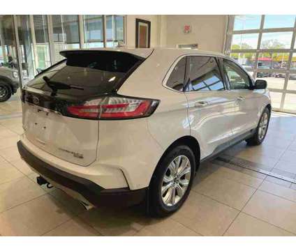 2020UsedFordUsedEdgeUsedAWD is a White 2020 Ford Edge Car for Sale in Milwaukee WI