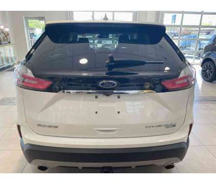 2020UsedFordUsedEdgeUsedAWD is a White 2020 Ford Edge Car for Sale in Milwaukee WI